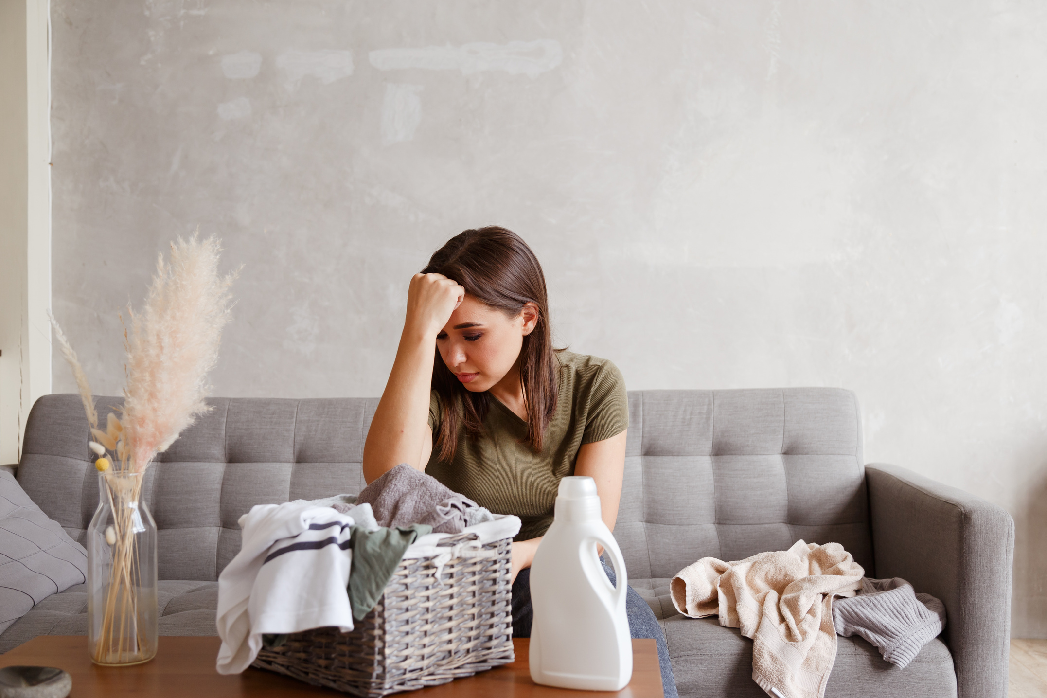 Young Woman Tired from Housework Routine